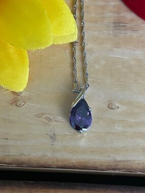 Elegant Silver Teardrop Necklace with Purple Gem